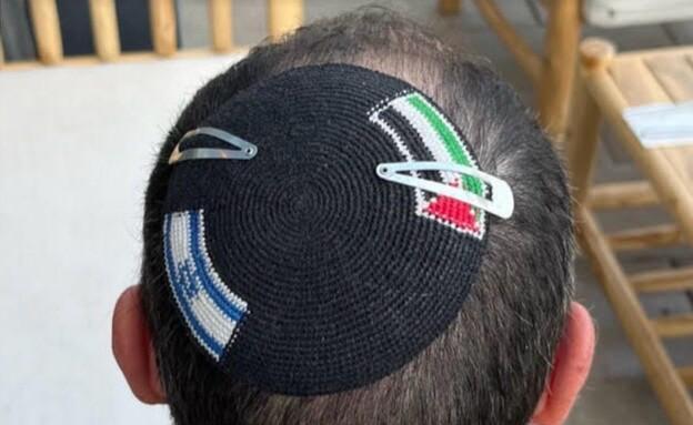 جدل إثر قص علم فلسطين كان لجانب علم إسرائيل داخل مركز شرطة