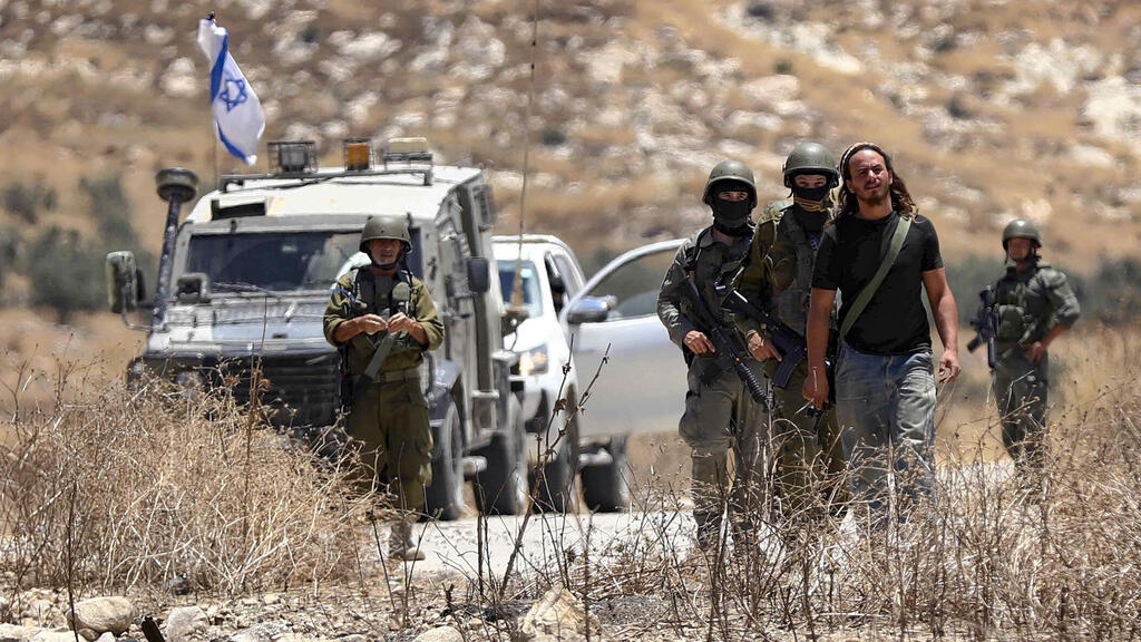 اعتداءا مستوطنين في الضفة الغربية (فلاش 90) اعتداءا مستوطنين في الضفة الغربية
